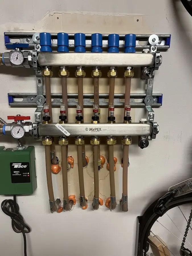 Plumber performing Water Heater Repair at a residential property in Idaho Falls